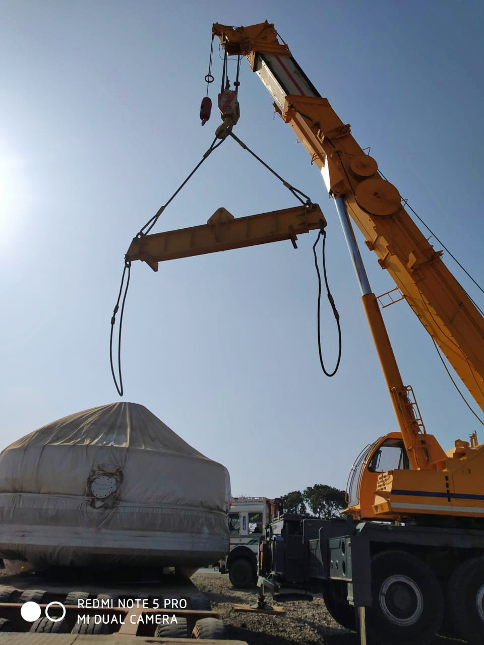 Unloading of 45 ton generator at Wind Mill site.